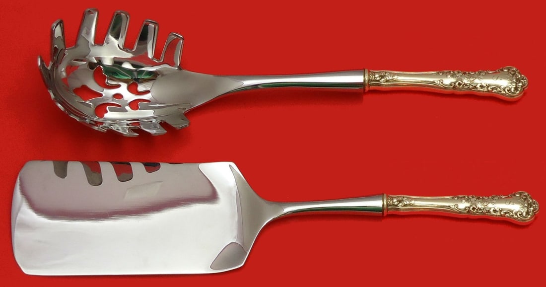 International Sterling Silver Pansy 2pc Custom Pasta Server Set: International Sterling Silver Pansy 2pc Custom Pasta Server Set Enhance your dining experience with the exquisite Pansy Hostess Set by International Sterling Silver. This elegant 2-piece Italian pasta