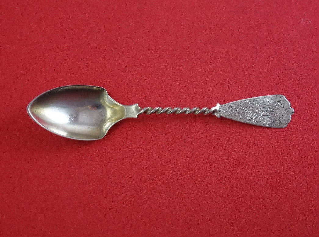 Tiffany & Co Sterling Silver Ice Cream Spoon Gold Wash Twist Handle 5 3/4": Tiffany & Co Sterling Silver Ice Cream Spoon Gold Wash Twist Handle 5 3/4" Indulge in a touch of elegance with this exquisite sterling silver ice cream spoon by Tiffany & Co. Crafted between 1850 and