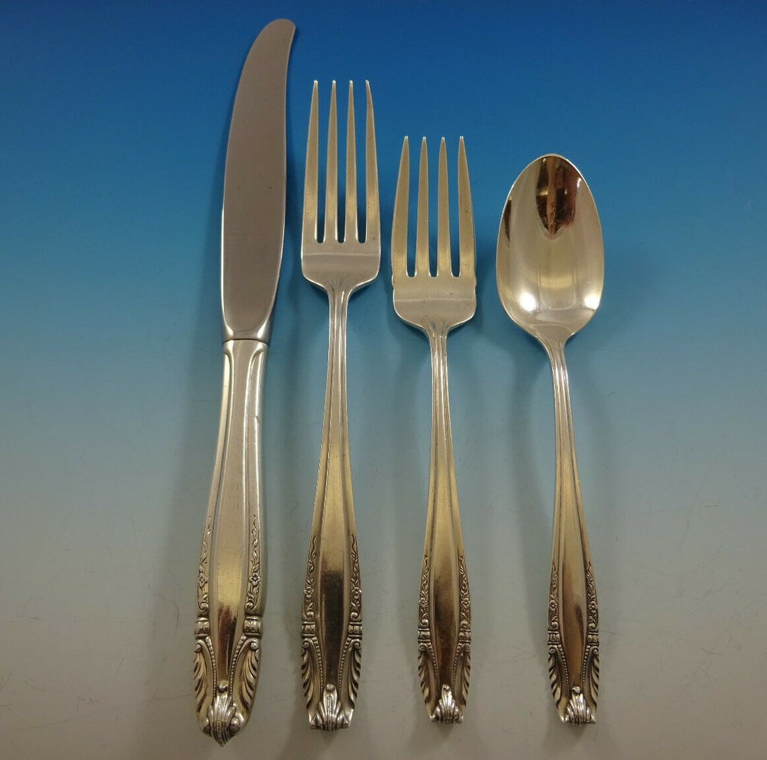 Wallace Stradivari Sterling Silver Flatware Set for 12 - 55 Pieces: Wallace Stradivari Sterling Silver Flatware Set for 12 - 55 Pieces Experience the elegance of dining with the Stradivari Sterling Silver Flatware Set by Wallace, designed for 12 guests. This exquisite