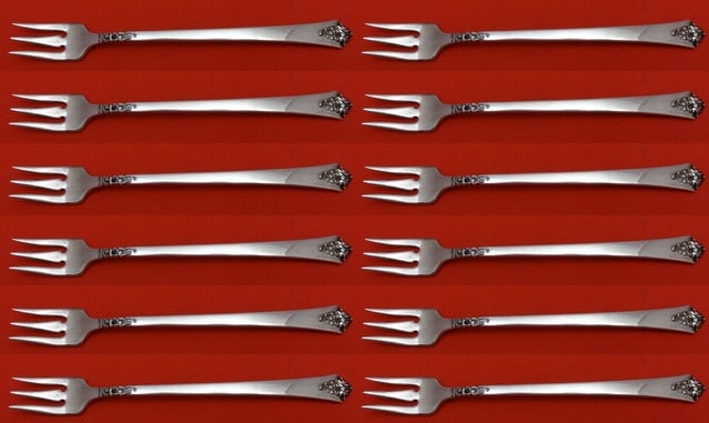 Royal Crest Castle Rose Sterling Silver Cocktail Forks Set of 12: Royal Crest Castle Rose Sterling Silver Cocktail Forks Set of 12 This elegant 12-piece set of cocktail forks features the Castle Rose pattern by Royal Crest, crafted from high-quality sterling silver.