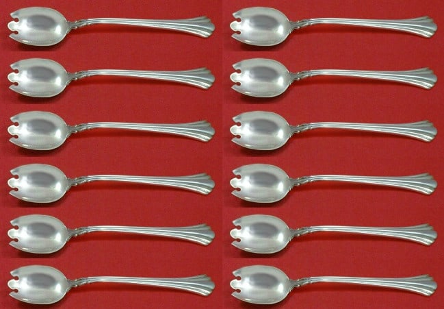 Reed and Barton Eighteenth Century Sterling Silver Ice Cream Fork 12-Piece Set: Reed and Barton Eighteenth Century Sterling Silver Ice Cream Fork 12-Piece Set Indulge in the timeless elegance of the Eighteenth Century Ice Cream Dessert Fork by Reed & Barton. This exquisite piece