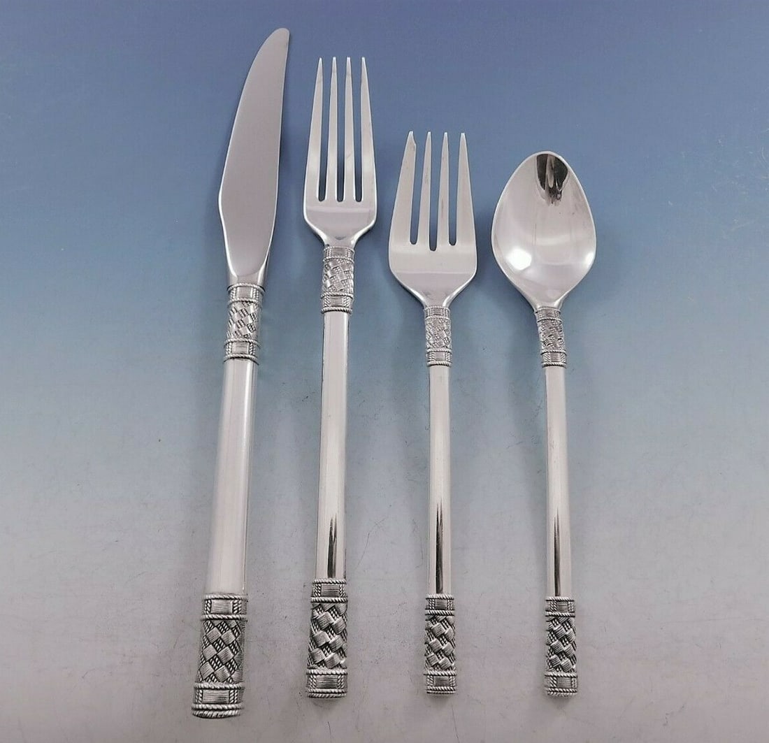 Wallace Aegean Weave Plain Sterling Silver Flatware Set 38 pcs for 8: Wallace Aegean Weave Plain Sterling Silver Flatware Set 38 pcs for 8 Enhance your dining experience with the exquisite Aegean Weave Plain Sterling Silver Flatware Set by Wallace. This elegant collecti
