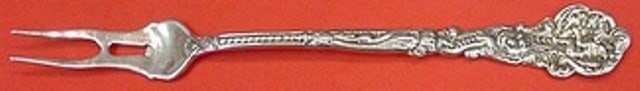 Gorham Versailles Sterling Silver 2-Tine Pickle Fork 6 1/8": Gorham Versailles Sterling Silver 2-Tine Pickle Fork 6 1/8" This exquisite pickle fork from Gorham's Versailles pattern showcases the elegance of sterling silver craftsmanship. Measuring 6 1/8 inches,