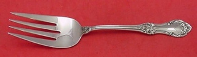 International Sterling Silver Wild Rose Serving Fork 8 3/4 inches: International Sterling Silver Wild Rose Serving Fork 8 3/4 inches This exquisite cold meat fork features the elegant Wild Rose pattern by International Sterling. Measuring 8 3/4 inches, it is crafted