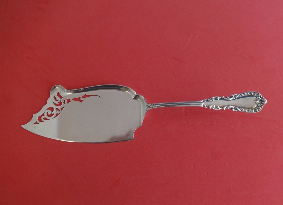 Reed & Barton Majestic Sterling Silver Ice Cream Slice 10 5/8": Reed & Barton Majestic Sterling Silver Ice Cream Slice 10 5/8" Experience the elegance of the Majestic ice cream slice by Reed & Barton, crafted from fine sterling silver. This exquisite piece measure