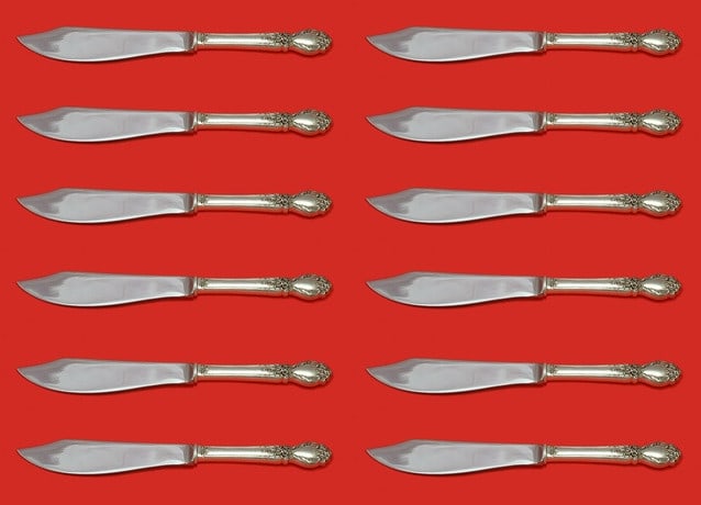 International Silver Brocade Fish Knife Set 12 Pieces 8 1/4 Inch: International Silver Brocade Fish Knife Set 12 Pieces 8 1/4 Inch This exquisite set of 12 fish knives features the elegant Brocade pattern by International Silver. Each knife boasts a hollow sterling