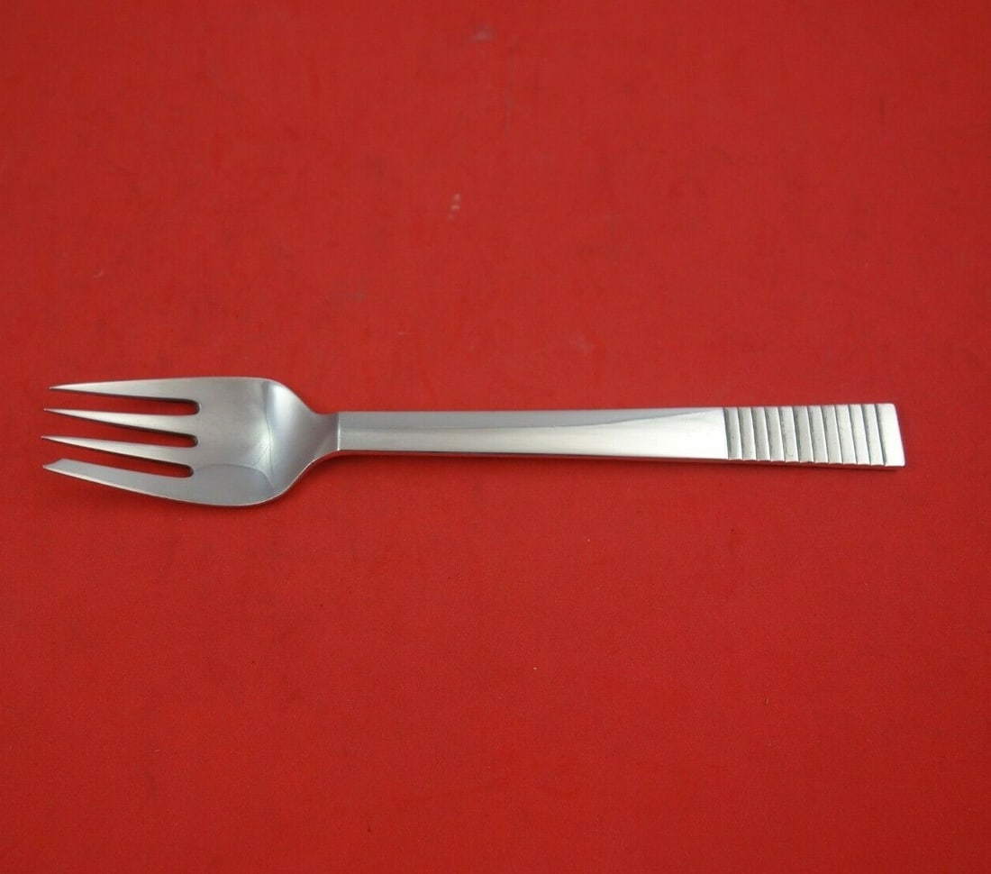 Georg Jensen Parallel Sterling Silver Salad Fork 4-Tine 6 1/4": Georg Jensen Parallel Sterling Silver Salad Fork 4-Tine 6 1/4" This exquisite salad fork from the renowned Georg Jensen showcases the elegant Parallel pattern. Made from high-quality sterling silver,
