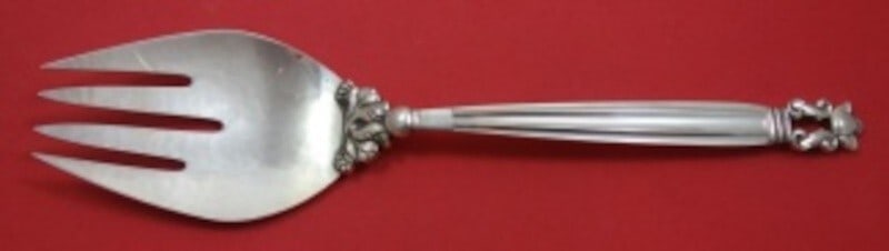 Georg Jensen Acorn Sterling Silver Hand-Hammered Serving Fork 9.5": Georg Jensen Acorn Sterling Silver Hand-Hammered Serving Fork 9.5" This exquisite vegetable fork, part of the renowned Acorn pattern by Georg Jensen, showcases a beautiful hand-hammered design crafted