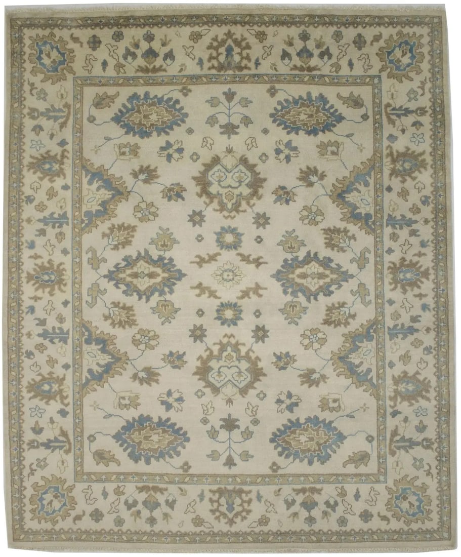 Hand-Knotted Wool Area Rug 9'10 x 8'2 Vintage Floral Traditional Design: Hand-Knotted Wool Area Rug 9'10 x 8'2 Vintage Floral Traditional Design This large hand-knotted Oushak Chobi area rug features a floral design with muted tones of cream, brown, and blue-gray. Crafted