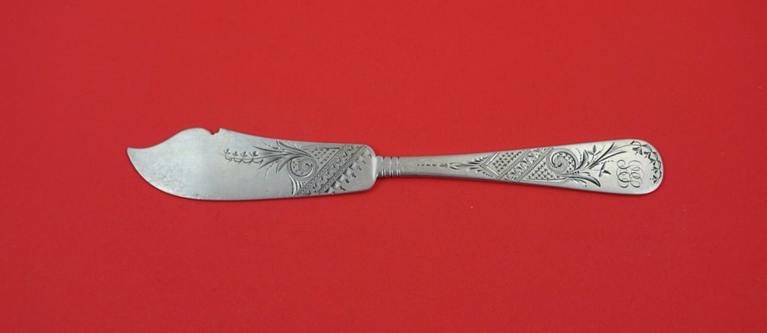 Bailey Banks and Biddle Sterling Silver Bright-Cut Fish Knife 7 1/4": Bailey Banks and Biddle Sterling Silver Bright-Cut Fish Knife 7 1/4" This exquisite fish knife by Bailey Banks & Biddle is crafted from high-quality sterling silver. Featuring a bright-cut design and