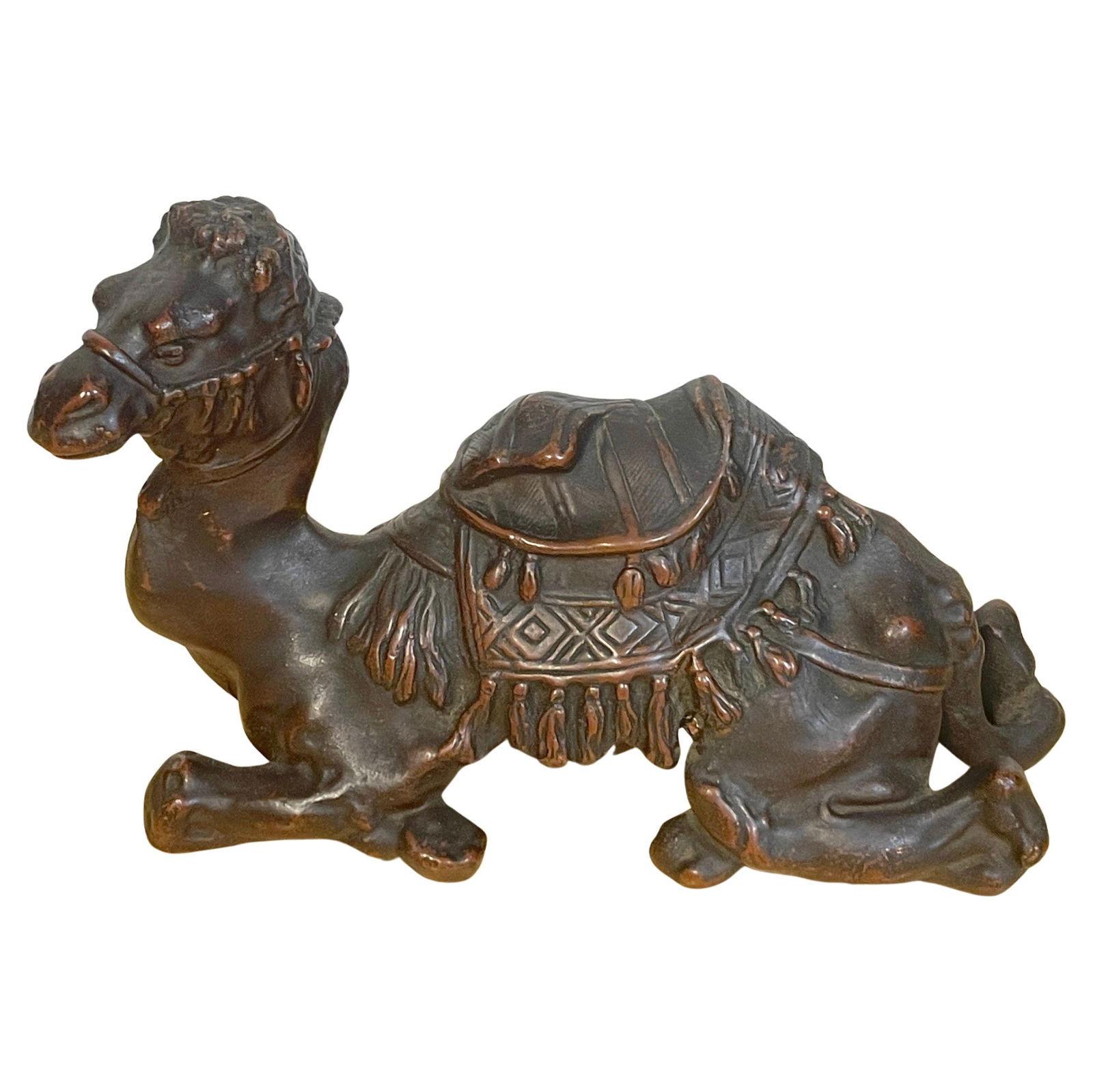 1920s Moorish Bronze Sculpture of Seated Camel: 1920s Moorish Bronze Sculpture of Seated Camel This exquisite 1920s bronze clad sculpture features a realistically modeled seated Moorish camel adorned with an intricate saddle. The craftsmanship refl