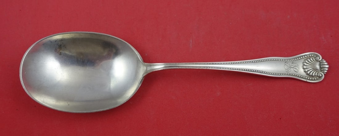 Frank Smith Newport Shell Sterling Silver Serving Spoon 8 3/4": Frank Smith Newport Shell Sterling Silver Serving Spoon 8 3/4" This exquisite serving spoon from the Newport Shell pattern by Frank Smith is made of sterling silver. With a plain bowl design, it measu