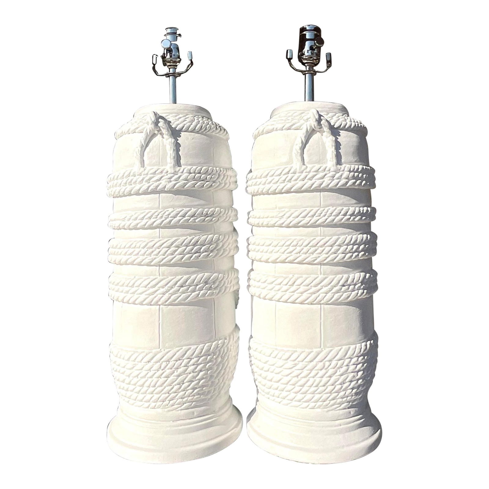 Chic Vintage Coastal Plaster Rope Table Lamps Pair: Chic Vintage Coastal Plaster Rope Table Lamps Pair Illuminate your space with this exquisite vintage Coastal pair of table lamps. Featuring a chic plaster finish and a stylish rope design, these lamps