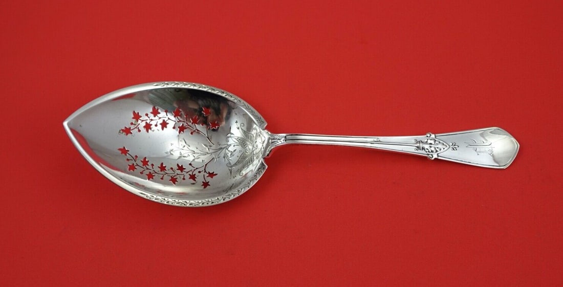 Gorham Swiss Sterling Silver Ice Spoon 9 Pierced Ivy Design: Gorham Swiss Sterling Silver Ice Spoon 9 Pierced Ivy Design This exquisite ice spoon from the 'Swiss' pattern by Gorham is crafted from high-quality sterling silver. Featuring an elegant pierced desig