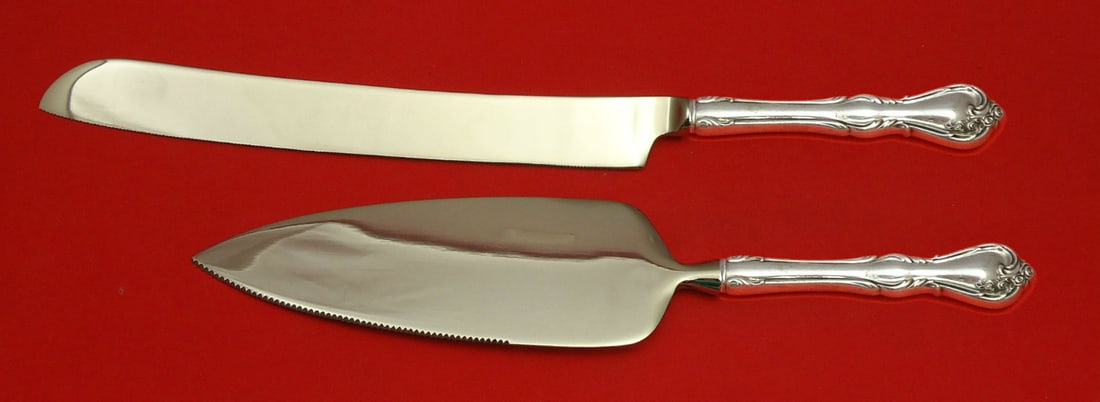 Reed & Barton Rose Cascade Sterling Silver Wedding Cake Set 2pc: Reed & Barton Rose Cascade Sterling Silver Wedding Cake Set 2pc Celebrate your special day with the exquisite Rose Cascade Wedding Cake Set by Reed & Barton. This stunning two-piece set features a cus