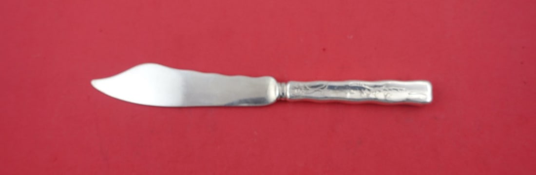 Tiffany & Co. Sterling Silver Lap Over Edge Fish Knife 7 5/8 with Sting Ray Motif: Tiffany & Co. Sterling Silver Lap Over Edge Fish Knife 7 5/8 with Sting Ray Motif This exquisite fish knife from Tiffany & Co. features the elegant Lap Over Edge pattern. Crafted from sterling silver,