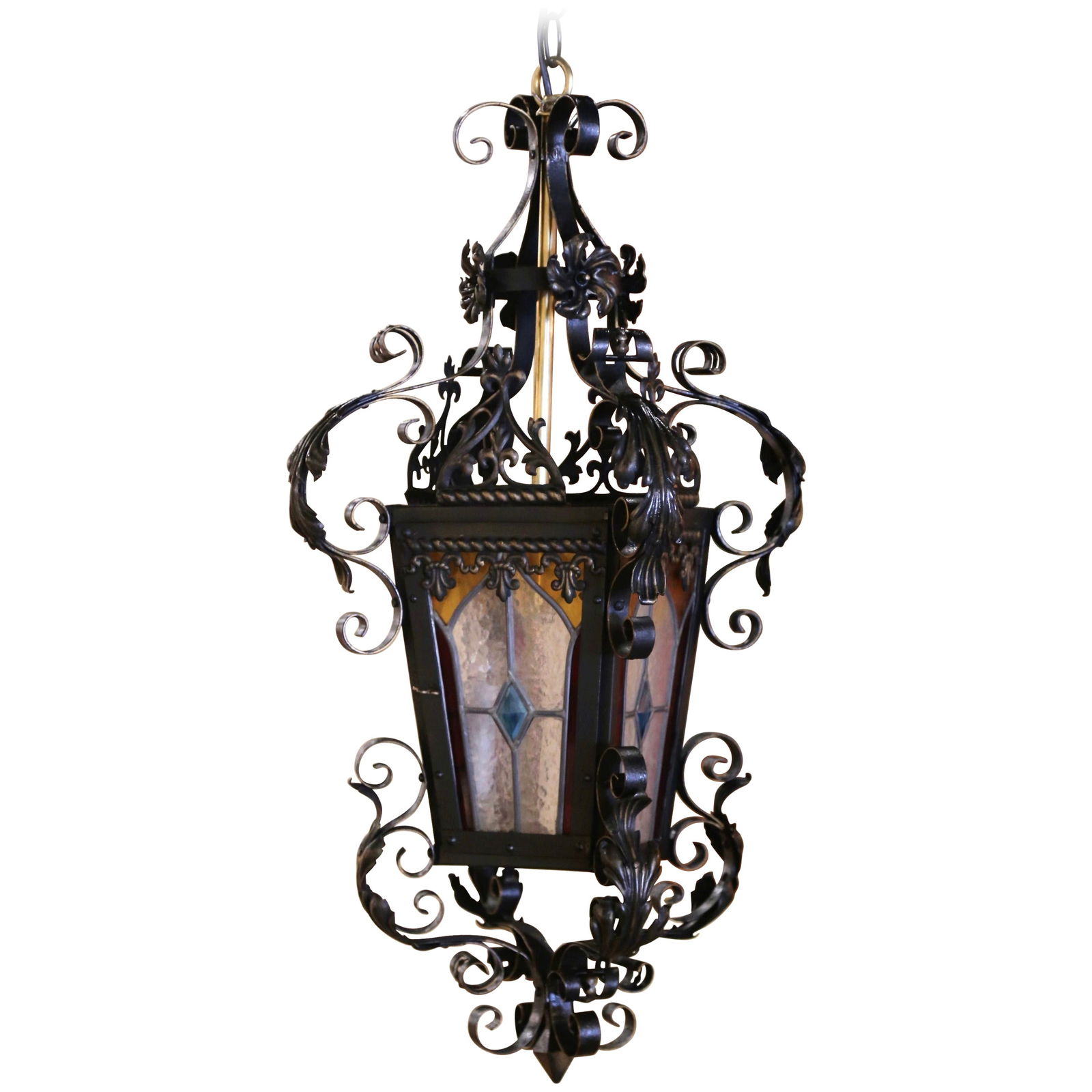 Antique Napoleon III Iron Lantern with Stained Glass Panels: Antique Napoleon III Iron Lantern with Stained Glass Panels Illuminate your space with this exquisite 19th Century French Napoleon III Iron Lantern, a stunning example of Gothic style craftsmanship. D
