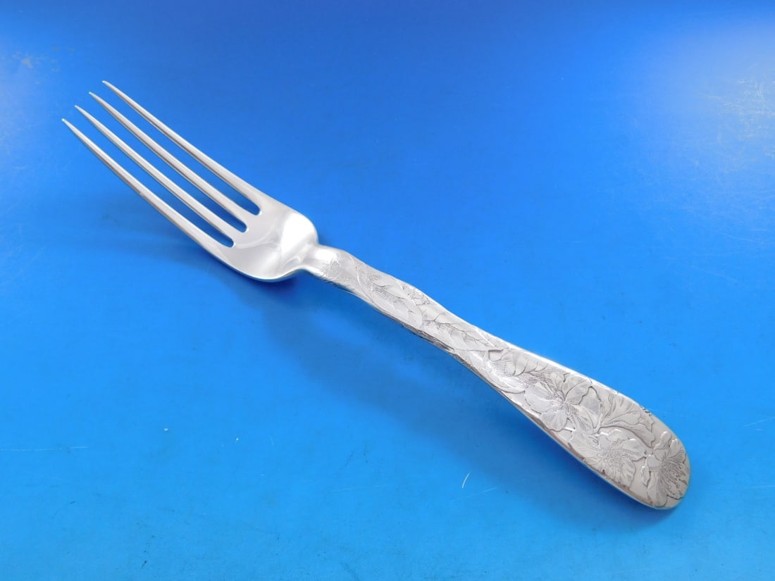 Tiffany Sterling Silver 7 7/8" Dinner Fork Rhododendron Pattern: Tiffany Sterling Silver 7 7/8" Dinner Fork Rhododendron Pattern This exquisite dinner fork from Tiffany & Co. features the elegant Lap Over Edge pattern, showcasing a beautiful rhododendron motif. Cra