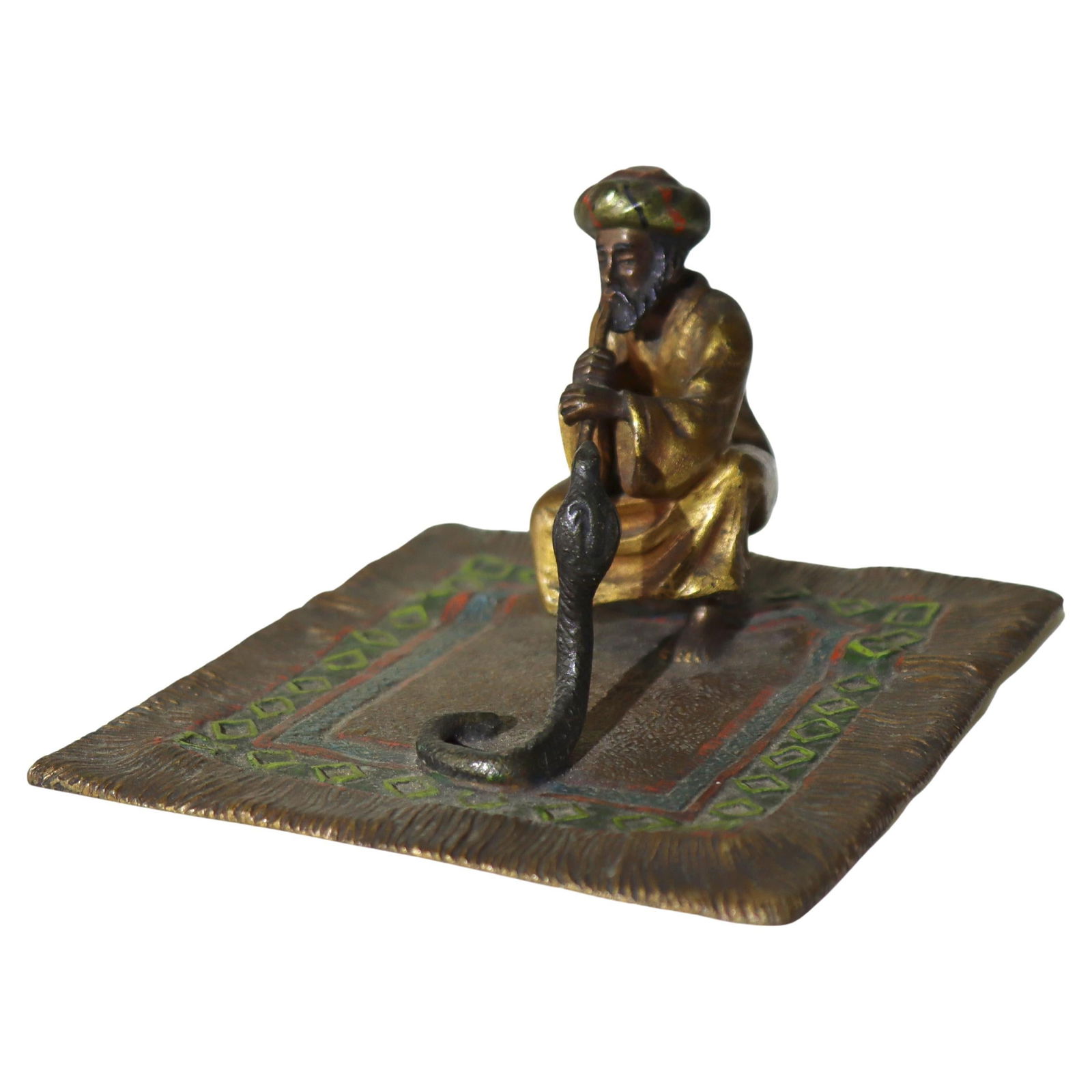 Franz Bergman C1910 Cold Painted Bronze Snake Charmer Figure: Franz Bergman C1910 Cold Painted Bronze Snake Charmer Figure This captivating cold-painted bronze figure by Franz Bergman, dating to circa 1910, depicts a snake charmer seated on a detailed rug. Renow