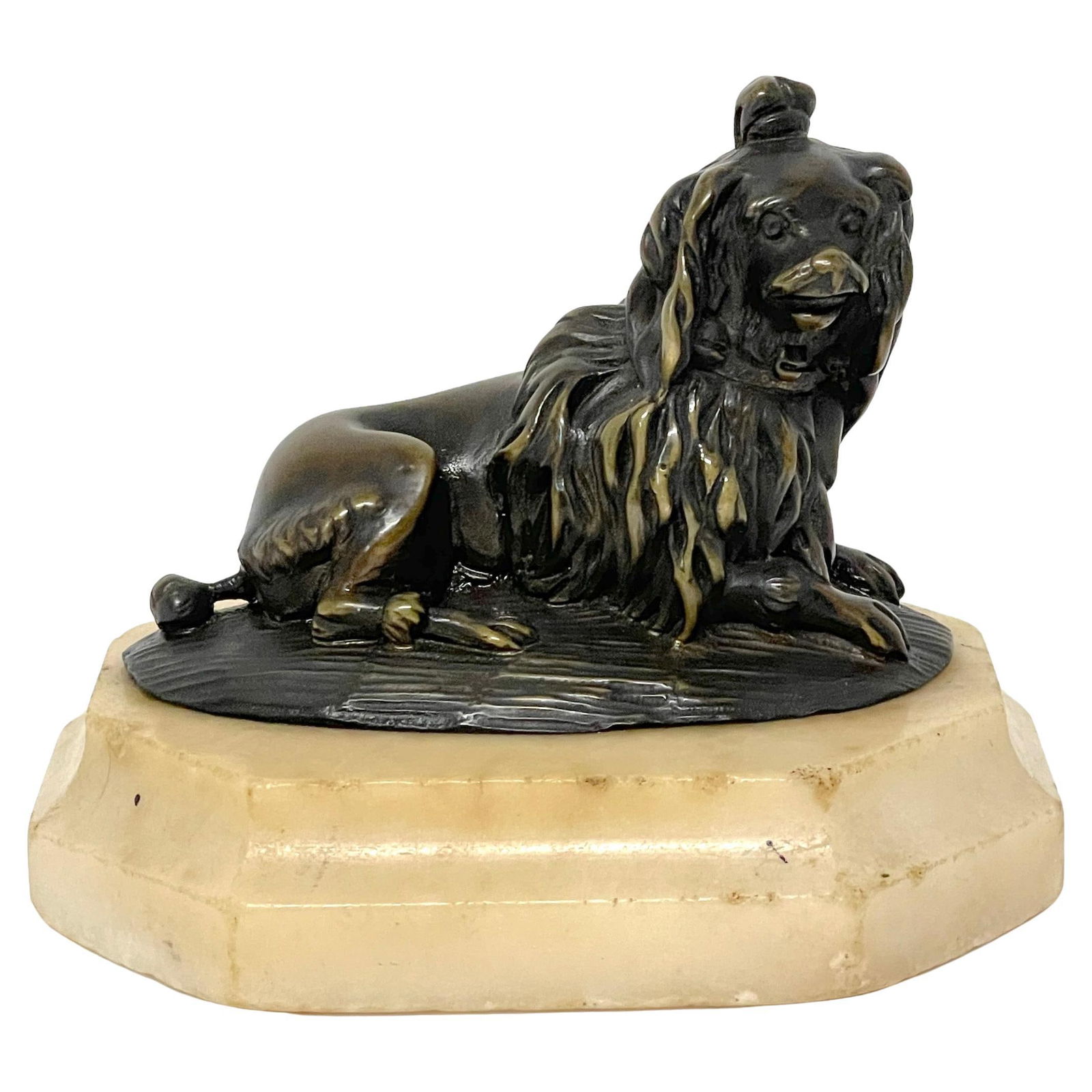 19th Century French Bronze Sculpture of Coiffed Poodle on Marble Base: 19th Century French Bronze Sculpture of Coiffed Poodle on Marble Base This exquisite early 19th century diminutive French bronze sculpture features a seated 'Coiffed' Poodle, capturing the elegance an