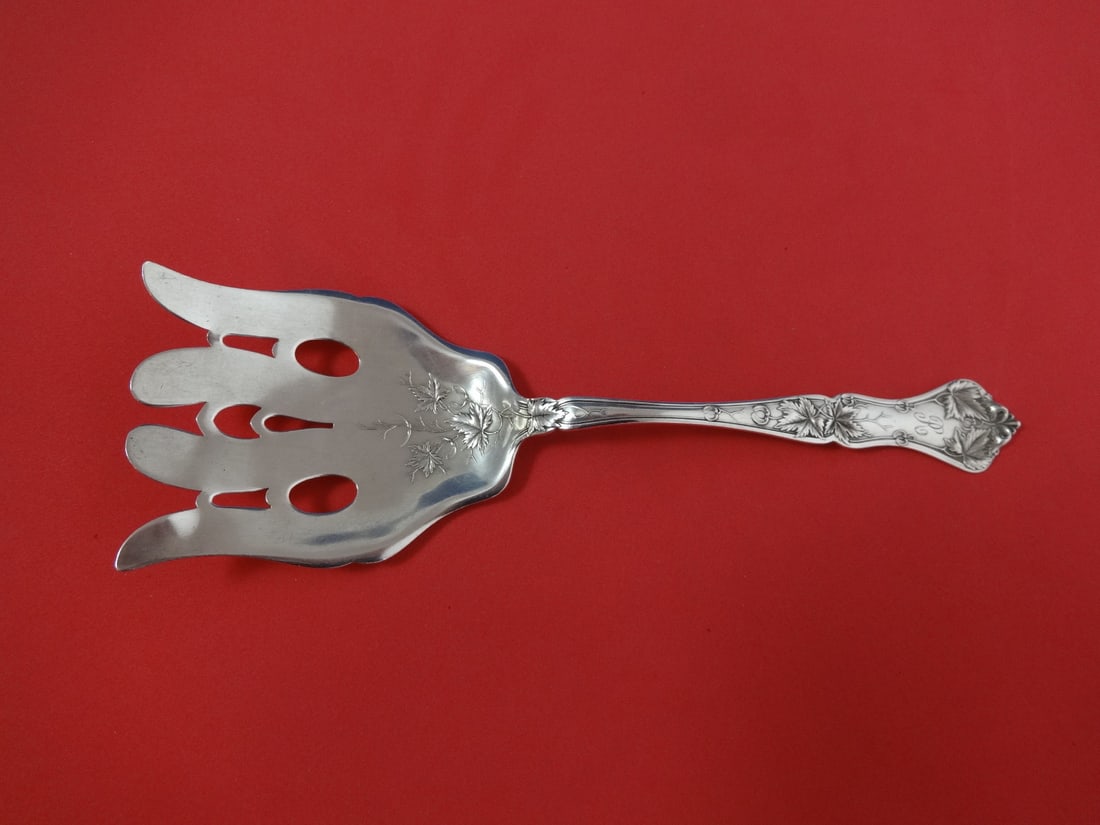 International Sterling Silver Edgewood Asparagus Fork 9 1/8" Monogrammed: International Sterling Silver Edgewood Asparagus Fork 9 1/8" Monogrammed This exquisite Edgewood serving fork by International is crafted from high-quality sterling silver, measuring 9 1/8 inches in l