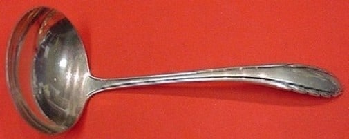 Gorham Lyric Sterling Silver Gravy Ladle 6.5 Inches: Gorham Lyric Sterling Silver Gravy Ladle 6.5 Inches This exquisite gravy ladle from Gorham's Lyric pattern is crafted from high-quality sterling silver, measuring 6 1/2 inches in length. The ladle sho