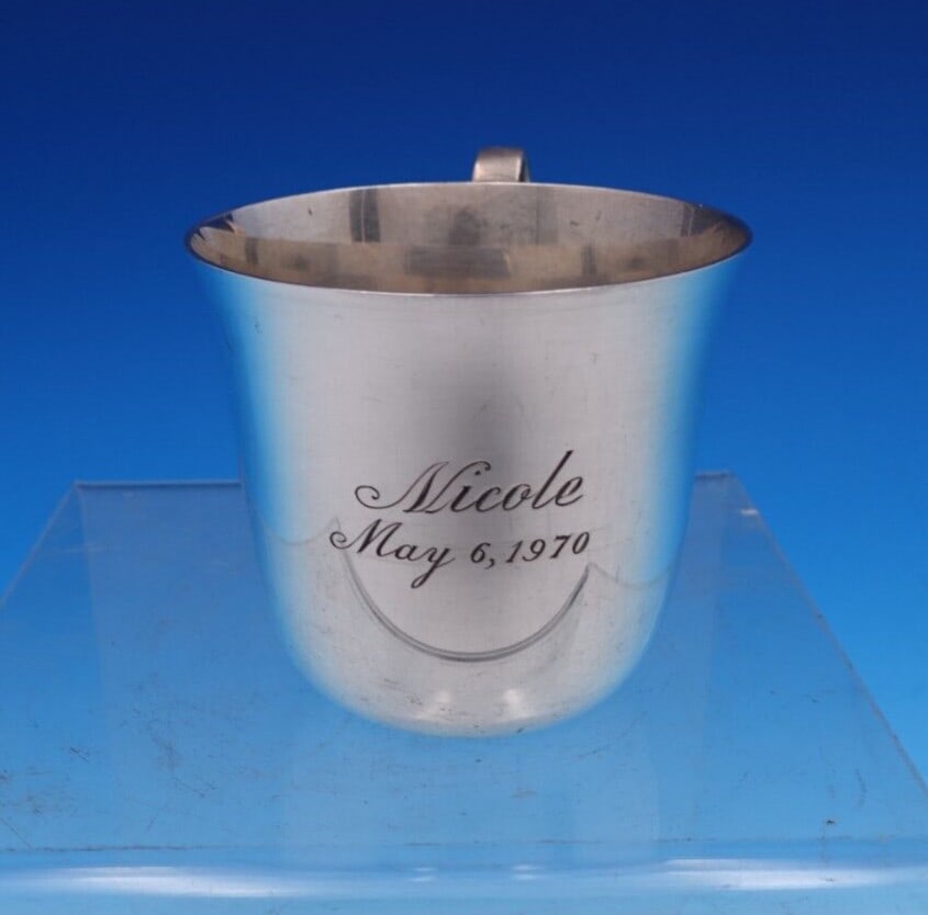 Tiffany & Co Sterling Silver Baby Cup #23498 Inscribed Nicole: Tiffany & Co Sterling Silver Baby Cup #23498 Inscribed Nicole This exquisite Tiffany & Co. Sterling Silver Baby Cup is a timeless piece perfect for a child's keepsake. Crafted from high-quality sterli