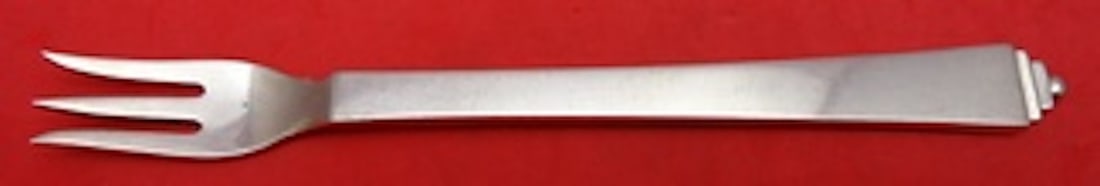 Georg Jensen Pyramid Sterling Silver Cocktail Fork 3-Tine 5 3/4": Georg Jensen Pyramid Sterling Silver Cocktail Fork 3-Tine 5 3/4" This exquisite cocktail fork is part of the Pyramid pattern by Georg Jensen, crafted from high-quality sterling silver. With a 3-tine d
