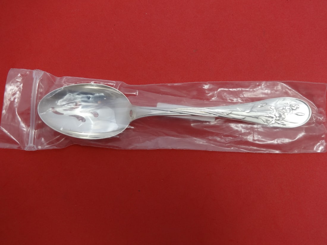 Lunt Quintessence Sterling Silver Slotted Serving Spoon 8 5/8" New: Lunt Quintessence Sterling Silver Slotted Serving Spoon 8 5/8" New This exquisite slotted serving spoon, part of the Quintessence pattern by Lunt, is crafted from high-quality sterling silver. Measuri