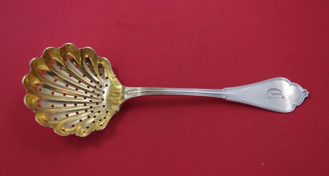 Vanderslice Gothic Sterling Silver Sugar Sifter Gold Washed 7 7/8": Vanderslice Gothic Sterling Silver Sugar Sifter Gold Washed 7 7/8" This exquisite Gothic style sugar sifter is crafted from sterling silver and features a beautiful shell design. Made by Vanderslice b