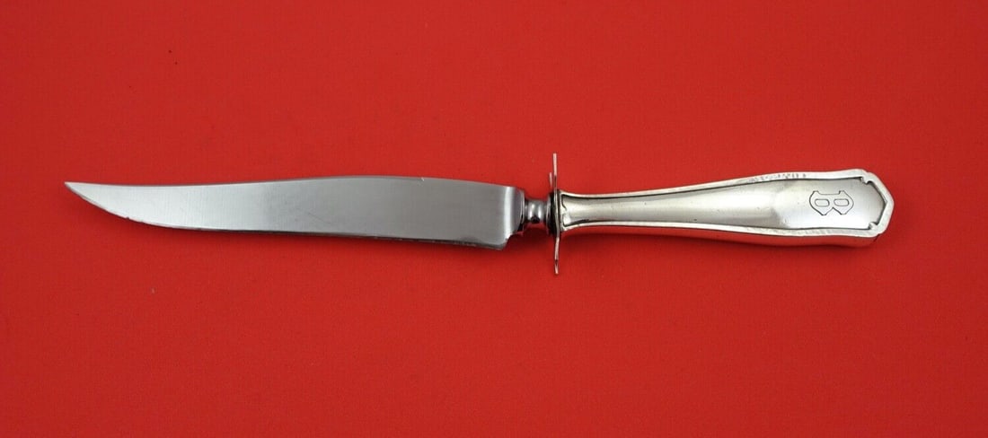 Shreve Dolores Sterling Silver Steak Carving Knife 9 7/8": Shreve Dolores Sterling Silver Steak Carving Knife 9 7/8" This exquisite steak carving knife is part of the Dolores pattern by Shreve, crafted from high-quality sterling silver. The knife features a h