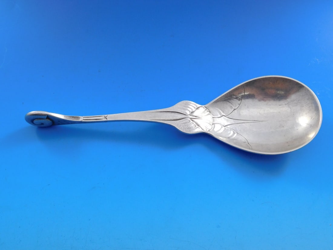 Georg Jensen Ornamental 50 Sterling Silver Snail Berry Spoon 7 3/4 Inch: Georg Jensen Ornamental 50 Sterling Silver Snail Berry Spoon 7 3/4 Inch This sterling silver berry spoon features the Ornamental #50 pattern by Georg Jensen, showcasing a distinctive snail design. Mea