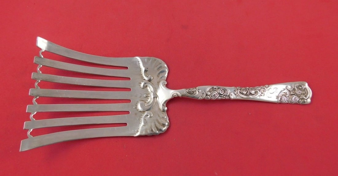 Whiting Sterling Silver 10" Asparagus Fork Rose and Scroll Pattern: Whiting Sterling Silver 10" Asparagus Fork Rose and Scroll Pattern Introducing a beautifully crafted 10" asparagus fork from the renowned Whiting brand, featuring the elegant Rose and Scroll pattern.
