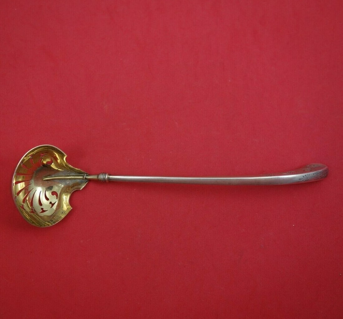 Gorham Angelo Sterling Silver Sugar Sifter Ladle 8 Gold Washed Bright-Cut: Gorham Angelo Sterling Silver Sugar Sifter Ladle 8 Gold Washed Bright-Cut This exquisite sugar sifter ladle from the Angelo pattern by Gorham is crafted from sterling silver with a gold-washed and bri