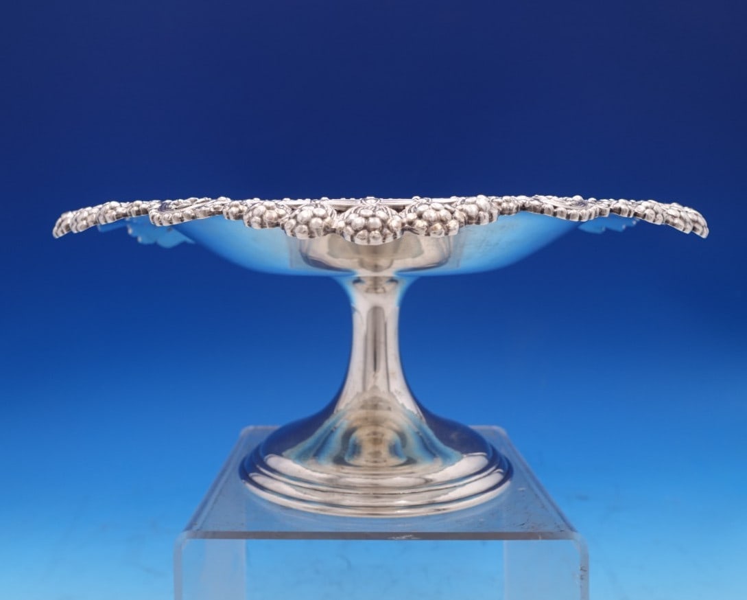 Tiffany & Co Vine Sterling Silver Compote with Raspberries 4 x 9 Inch: Tiffany & Co Vine Sterling Silver Compote with Raspberries 4 x 9 Inch Discover the elegance of the Vine by Tiffany & Co. Sterling Silver Compote, featuring a beautiful raised design with raspberries.
