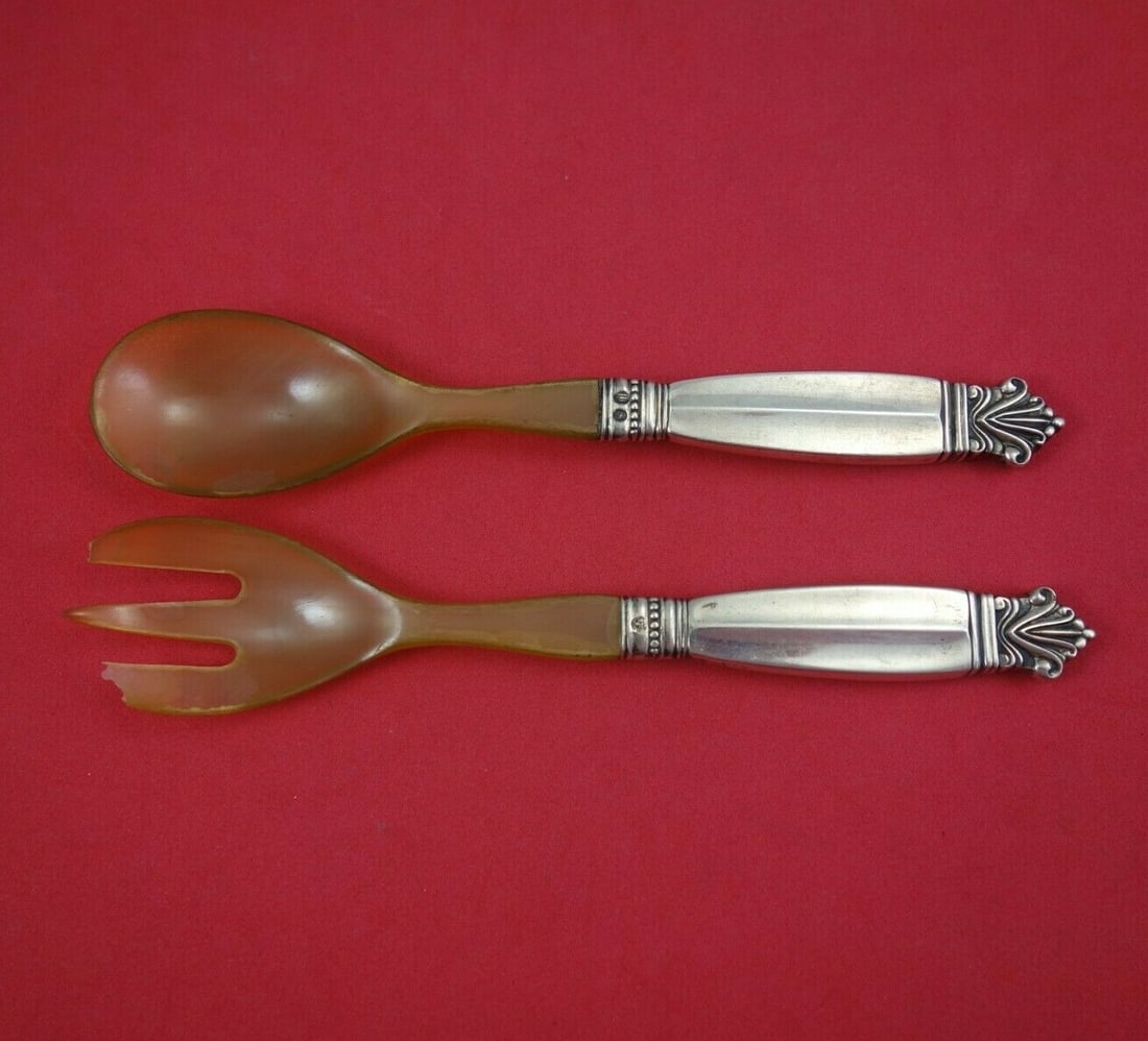 Georg Jensen Acanthus Sterling Silver Caviar Set 2pc with Horn Handles: Georg Jensen Acanthus Sterling Silver Caviar Set 2pc with Horn Handles Discover the elegance of the Acanthus Caviar Set, crafted by Georg Jensen. This exquisite 2-piece set features a sterling silver