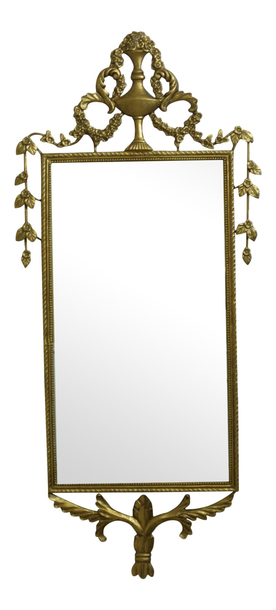 French Style Gold Gilt Iron Framed Urn Top Mirror 26.5 x 59: French Style Gold Gilt Iron Framed Urn Top Mirror 26.5 x 59 This stunning French Style Gold Gilt Iron Framed Mirror features a beautifully designed urn top and high-quality beveled glass. Crafted appr