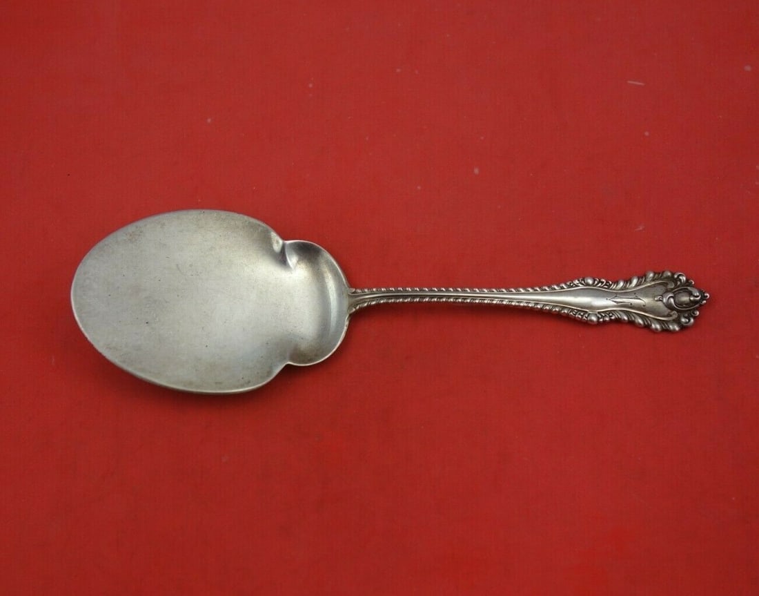 Dominick & Haff Mazarin Sterling Silver Tomato Server 8 1/8": Dominick & Haff Mazarin Sterling Silver Tomato Server 8 1/8" This elegant tomato server, crafted by Dominick & Haff, showcases the exquisite Mazarin pattern. Made of sterling silver, this piece dates