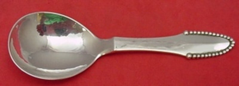 Georg Jensen Beaded Sterling Silver Sugar Spoon 4.5 Inch Serving: Georg Jensen Beaded Sterling Silver Sugar Spoon 4.5 Inch Serving This exquisite sugar spoon features the classic Beaded pattern by Georg Jensen, crafted from high-quality sterling silver. With a lengt