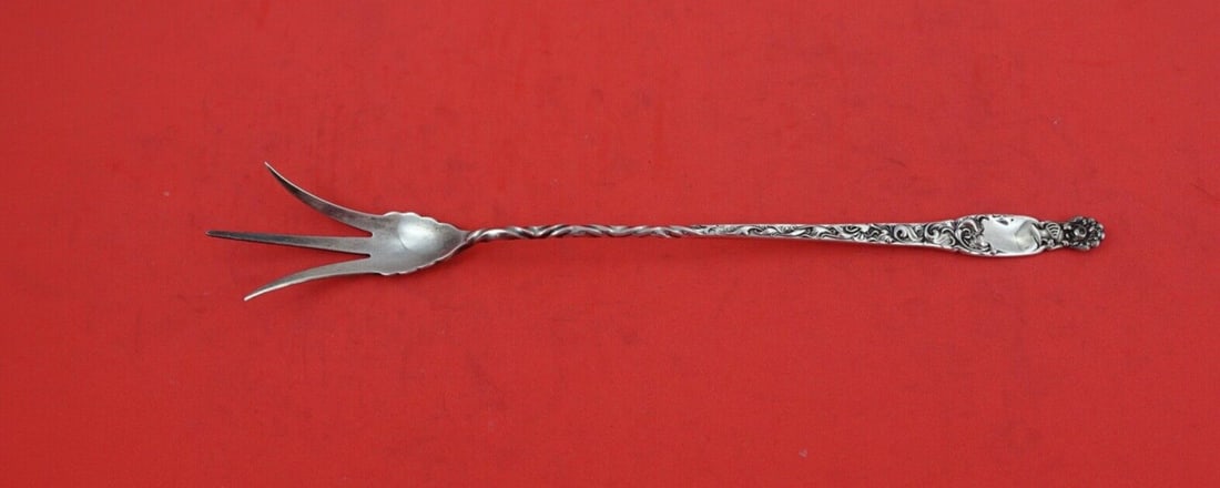 Whiting Heraldic Sterling Silver Twisted Lettuce Fork 9 Inch: Whiting Heraldic Sterling Silver Twisted Lettuce Fork 9 Inch This elegant lettuce fork from the Heraldic pattern by Whiting is crafted from high-quality sterling silver. Measuring 9 inches, it feature