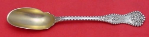 Dominick & Haff Charles II Sterling Silver Cheese Scoop Gold Wash 8 1/8": Dominick & Haff Charles II Sterling Silver Cheese Scoop Gold Wash 8 1/8" This exquisite cheese scoop is a remarkable example of 19th-century craftsmanship by Dominick & Haff, featuring the elegant Cha