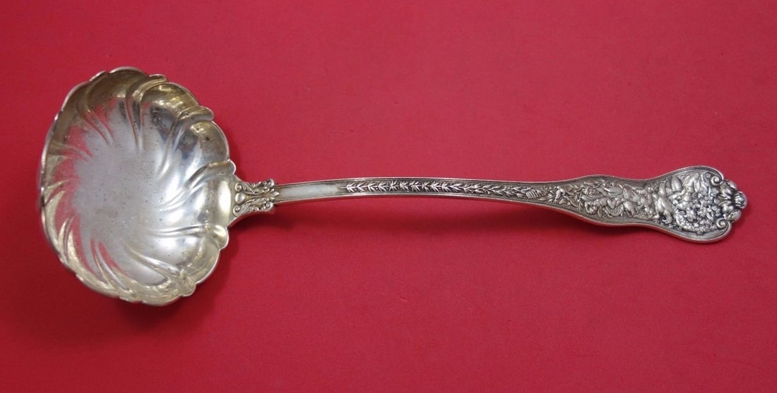Tiffany & Co Olympian Sterling Silver 11 1/2" Oyster Ladle Fluted Bowl: Tiffany & Co Olympian Sterling Silver 11 1/2" Oyster Ladle Fluted Bowl This exquisite oyster ladle from the Olympian pattern by Tiffany & Co. features a beautifully fluted bowl, measuring 11 1/2" in l