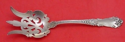 Reed & Barton La Marquise Sterling Silver Vegetable Serving Fork 8 7/8": Reed & Barton La Marquise Sterling Silver Vegetable Serving Fork 8 7/8" Elevate your dining experience with the exquisite La Marquise Vegetable Serving Fork from Reed & Barton. Crafted from high-quali