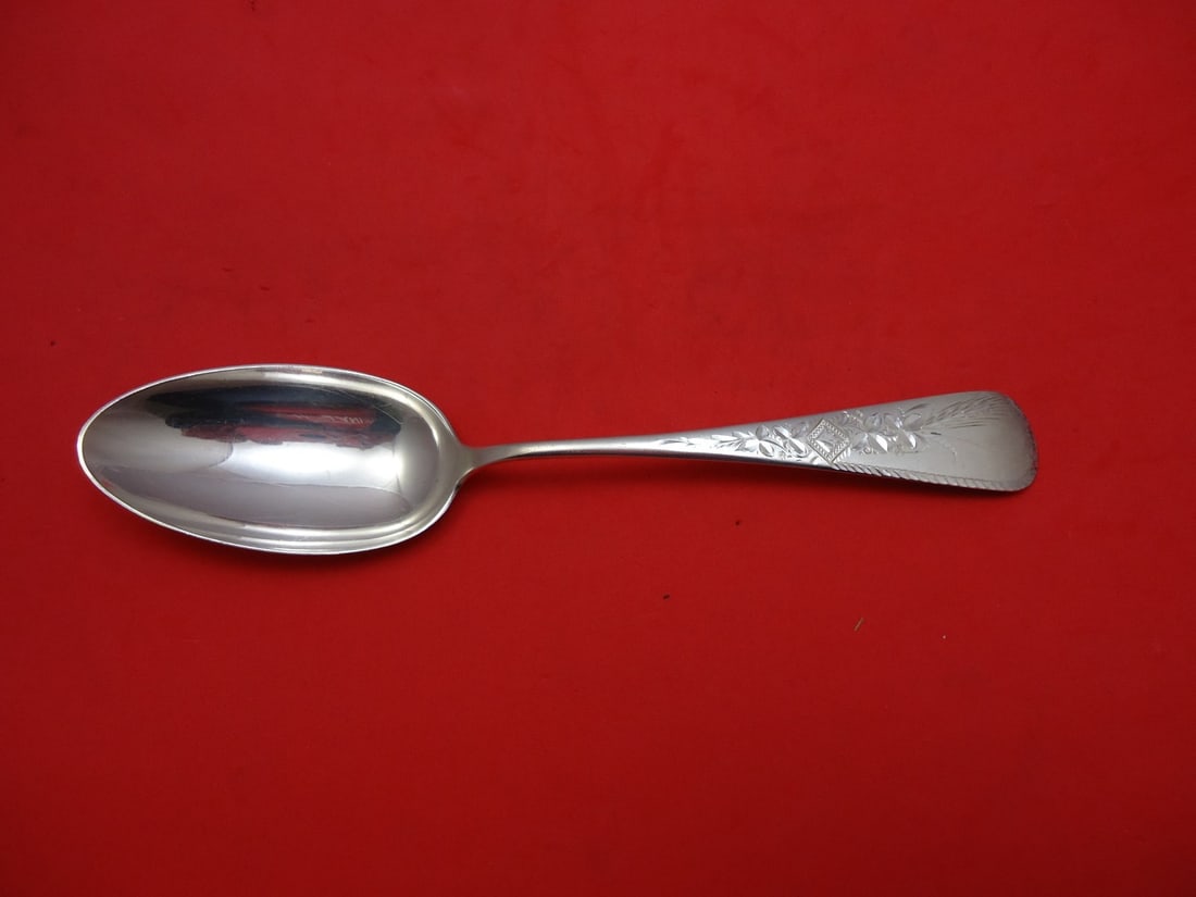 Gorham Sterling Silver Antique Engraved Serving Spoon 8 3/8": Gorham Sterling Silver Antique Engraved Serving Spoon 8 3/8" This exquisite serving spoon features the Antique Engraved pattern by Gorham, crafted from high-quality sterling silver. Measuring 8 3/8 in