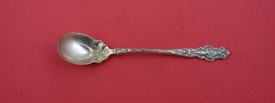 Wallace Irian Art Nouveau Sterling Silver Olive Spoon 6 1/8": Wallace Irian Art Nouveau Sterling Silver Olive Spoon 6 1/8" Enhance your dining experience with this exquisite Irian Olive Spoon by Wallace. Crafted from solid sterling silver, this piece showcases t