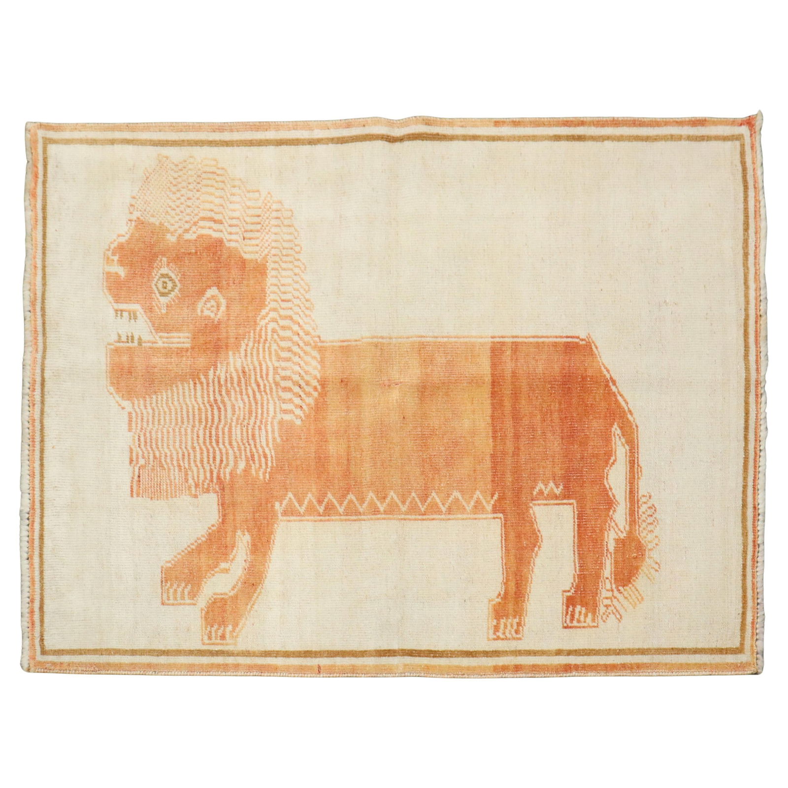 Mid-20th Century Persian Gabbeh Rug with Apricot Lion: Mid-20th Century Persian Gabbeh Rug with Apricot Lion Discover the beauty of this mid-20th-century Persian Gabbeh rug, featuring a striking apricot-colored lion set against an ivory background. This p