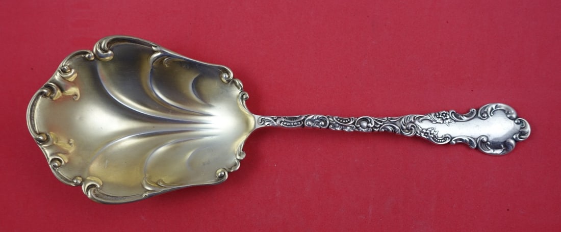 Campbell Metcalf Geneva Sterling Silver Berry Spoon Gold Washed 8 3/4": Campbell Metcalf Geneva Sterling Silver Berry Spoon Gold Washed 8 3/4" This exquisite serving spoon is a sterling silver berry spoon from the renowned Geneva pattern by Campbell Metcalf. Measuring 8 3