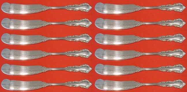 Reed & Barton Georgian Rose Sterling Silver Butter Spreaders Set of 12: Reed & Barton Georgian Rose Sterling Silver Butter Spreaders Set of 12 This exquisite 12-piece set of butter spreaders features the elegant Georgian Rose pattern by Reed & Barton. Crafted from high-qu