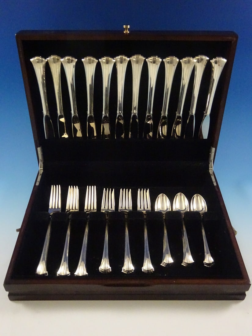 Gorham Newport Scroll Sterling Silver Flatware Set 48 Pieces for 12: Gorham Newport Scroll Sterling Silver Flatware Set 48 Pieces for 12 Experience the elegance of dining with the Newport Scroll by Gorham Sterling Silver Flatware Set. This exquisite 48-piece collection