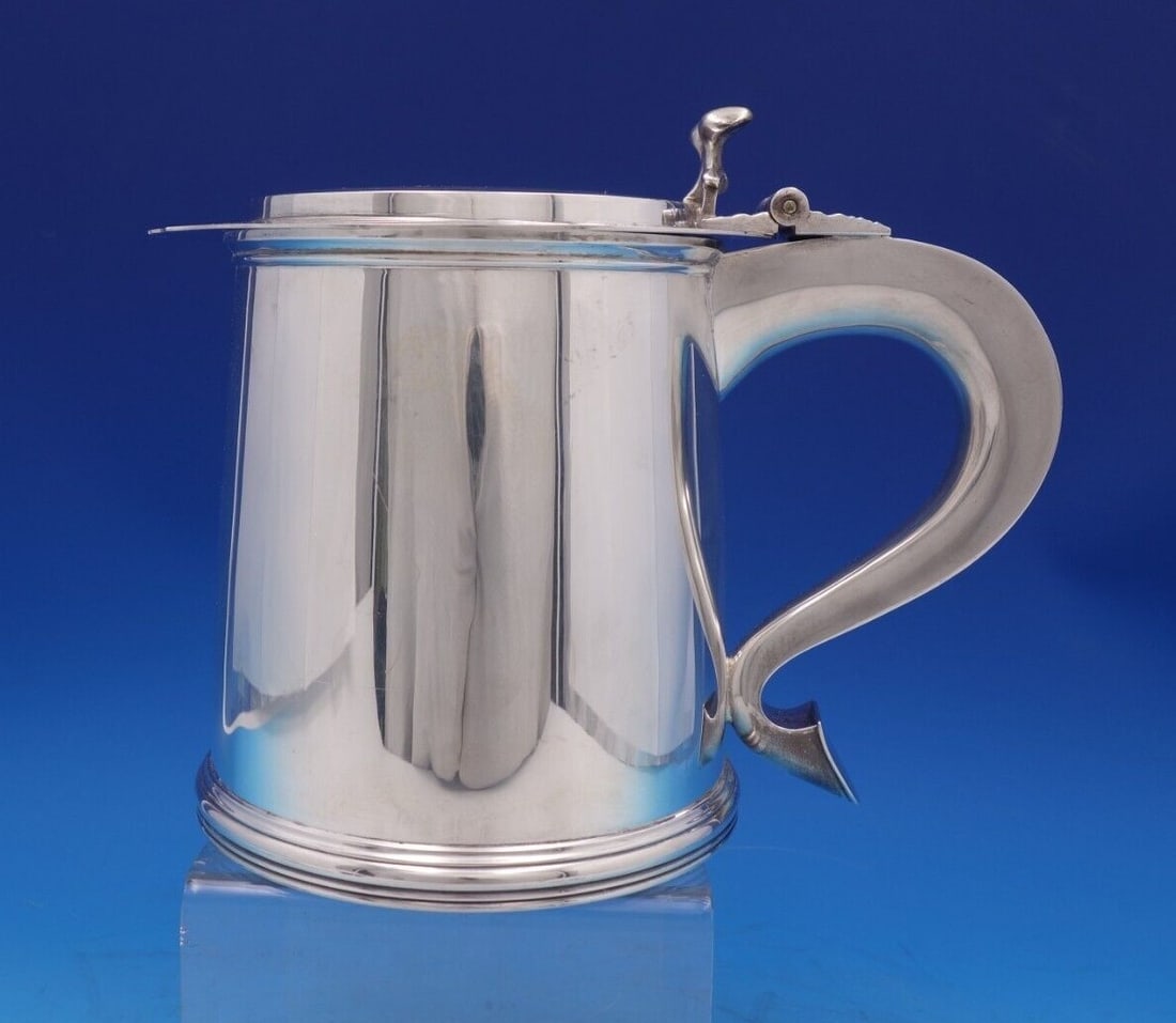Tiffany & Co Colonial Sterling Silver Tankard Wine Cooler 1985 Massive: Tiffany & Co Colonial Sterling Silver Tankard Wine Cooler 1985 Massive This stunning Colonial-style wine cooler tankard by Tiffany & Co. is a remarkable piece of craftsmanship, made from high-quality